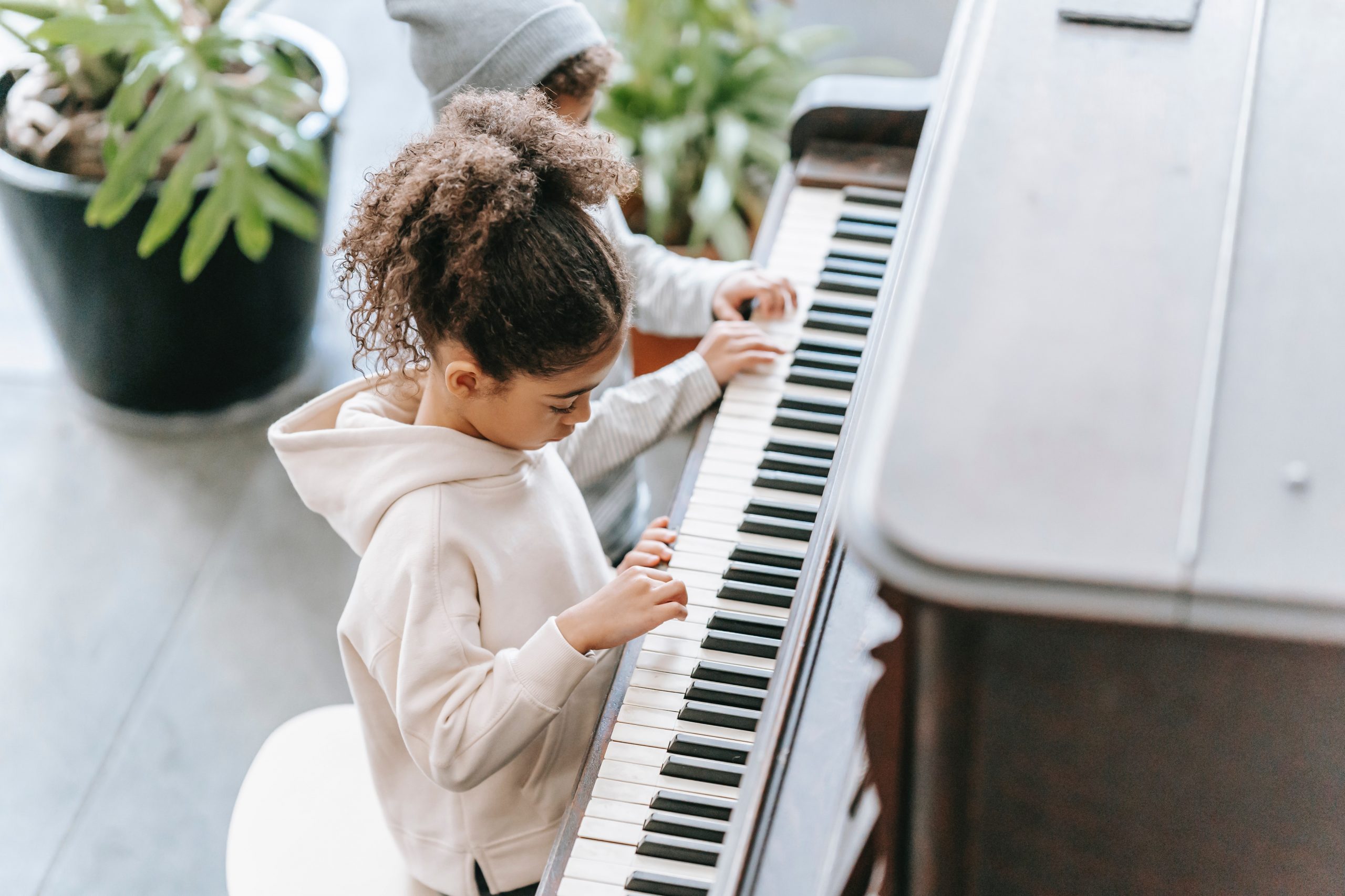 Child learning piano